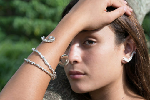 Octopus bracelets and earrings on model