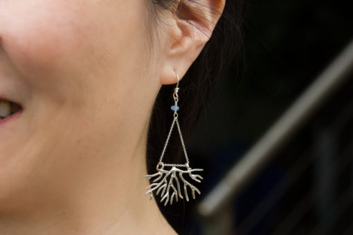 bryozoan earring on model