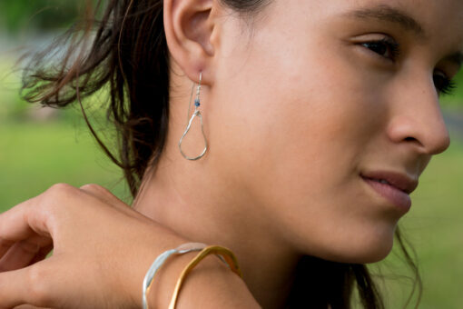 Wai medium ear wire earrings on model - sterling silver